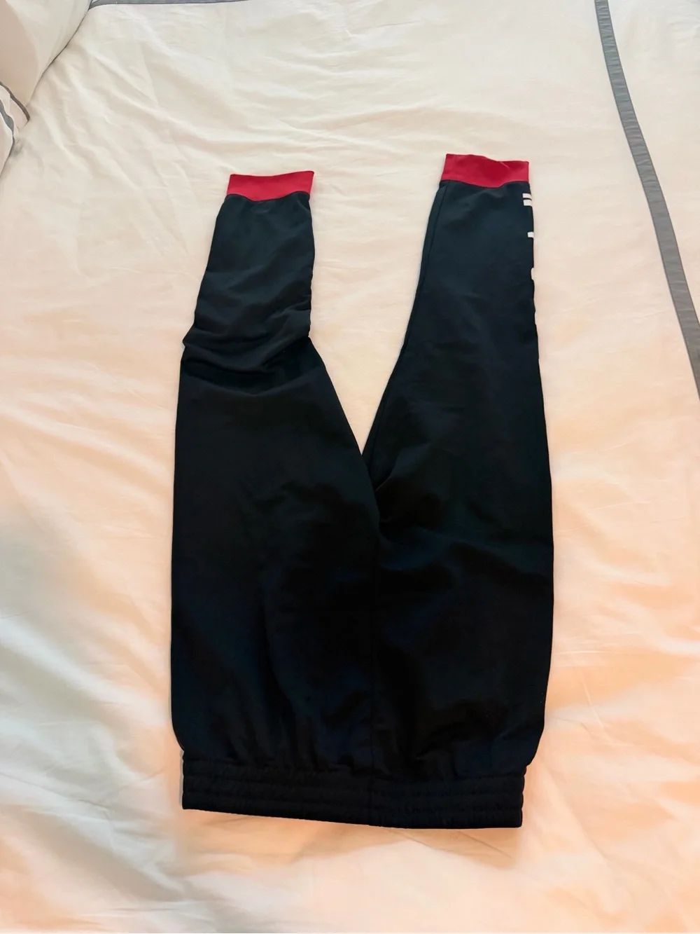Jordan Kids Red and Black Track Set with Logo size medium like new!